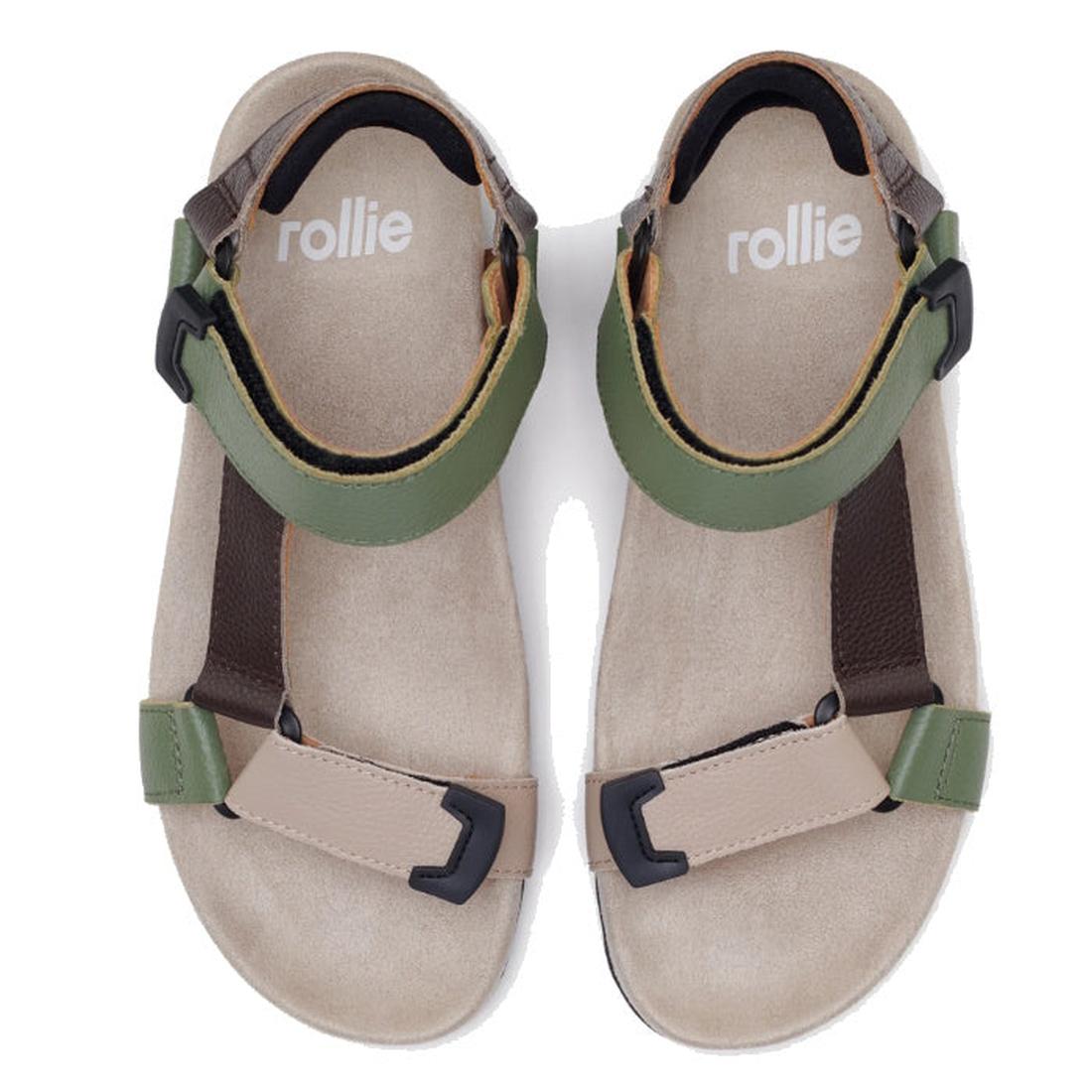 A pair of Rollie Womens Sandal Tooth Wedge Trail Green Brown sandals with beige footbeds, olive green adjustable leather straps, and black buckles, viewed from above on a white background., 48166, 9781760794064, 9781760794071, 9781760794088, 48170
