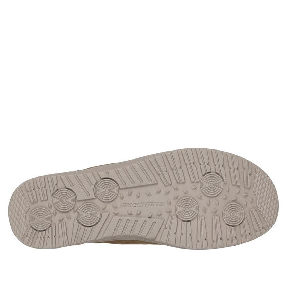 The image shows the beige rubber sole of the Skechers Mens Slip Ins Melson - Classy Moc Tan, featuring circular tread patterns, straight grooves, small nubs, and "Skechers" embossed in the center., 198376452049, 198376452056, 198376452063, 198376452070, 1
