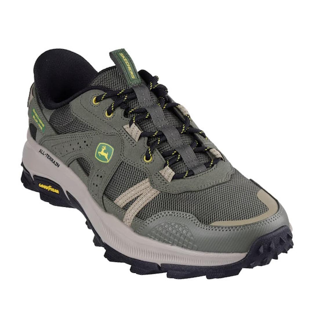 The Skechers John Deere Equalizer 5.0 Trail Harvester Slip-Ins Green features a rugged tread, yellow accents, side logo, mesh and synthetic upper, black and yellow laces, plus Air-Cooled Memory Foam for all-day comfort.