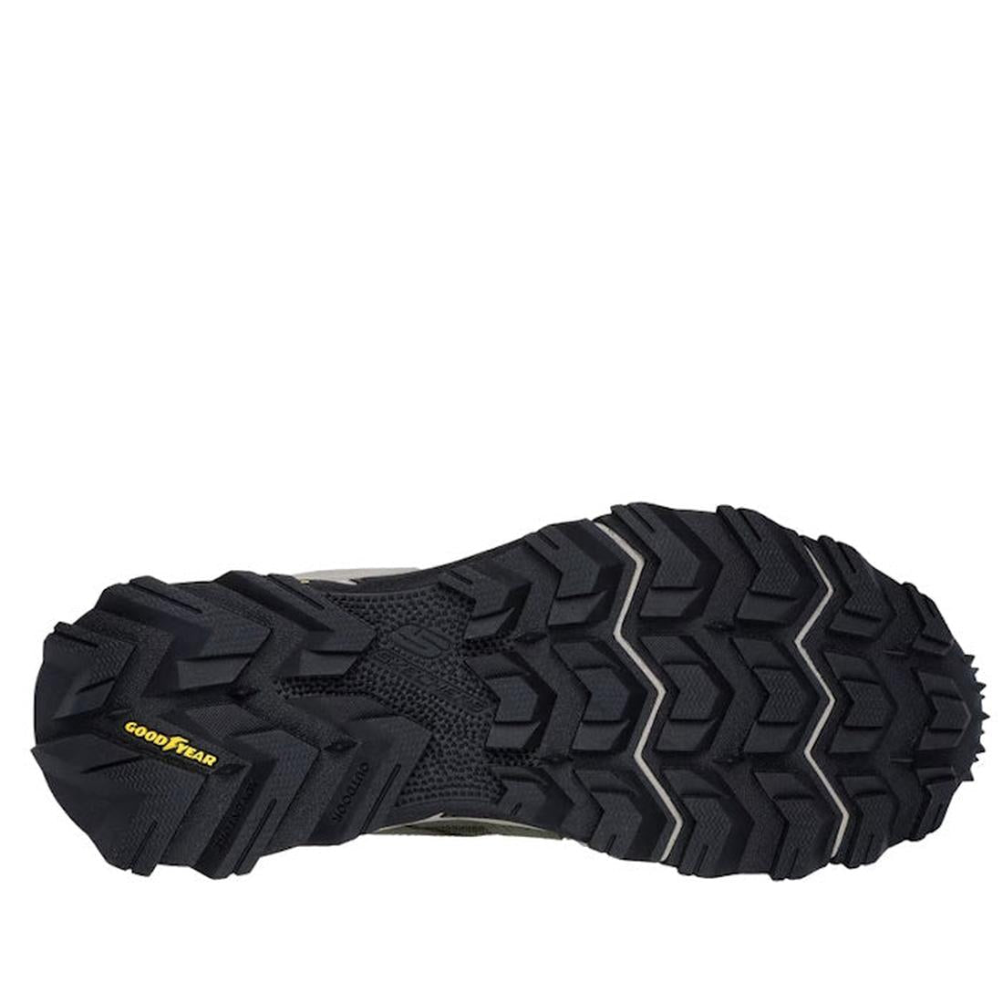 The Skechers John Deere Equalizer 5.0 Trail Harvester Slip Ins Green features a black rugged hiking sole with deep, patterned treads for traction, Goodyear rubber for quality, and Air-Cooled Memory Foam for sturdy comfort inspired by Hands Free Slip-ins.,
