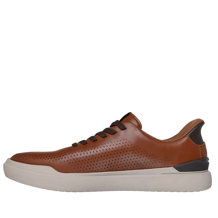 The Mens Skechers Slip-ins Owen Connell Brown is a brown leather sneaker with perforated sides, black laces, black heel accent, and a thick white rubber sole with memory foam insole, shown in side view against a white background.