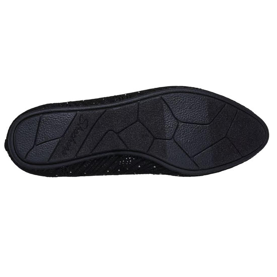 The image displays the black rubber sole of the Womens Skechers Cleo 2.0 Glitzy Daze Ballet Flat, featuring a textured geometric pattern for grip and the brand name embossed on the left side., 50212, 196989721118, 196989721132, 196989721156, 196989721170,