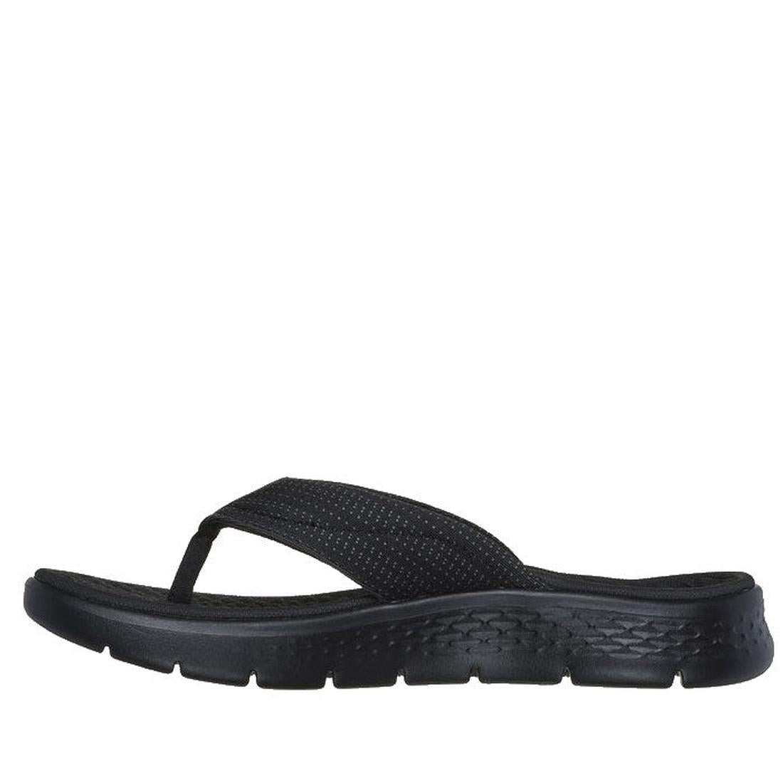The Skechers Go Walk Flex Sandal Impress Slide in Black, shown in a side view on a white background, features a textured sole, fabric thong strap, and memory foam footbed for all-day support., 197627864822, 197627864839, 197627864846, 197627864853, 197627
