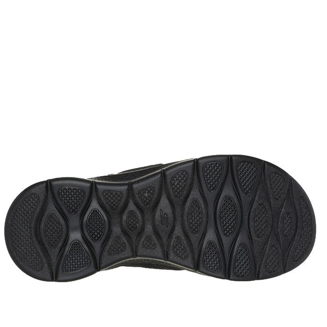 The image displays the black rubber outsole of the Skechers GO WALK Flex Sandal Impress Slide, featuring a textured wavy pattern with raised ovals for traction and grip, highlighting its durability., 197627864822, 197627864839, 197627864846, 197627864853,