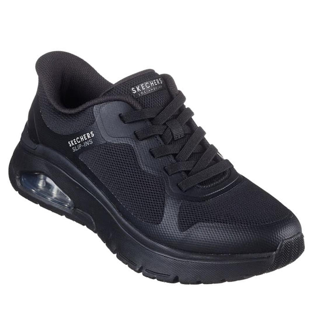 The Skechers Womens Uno Flex Ivorine Slip In Black is a slip-on athletic shoe with mesh and synthetic panels, memory foam cushioned sole, visible air heel cushion, and a handy lace-up design.