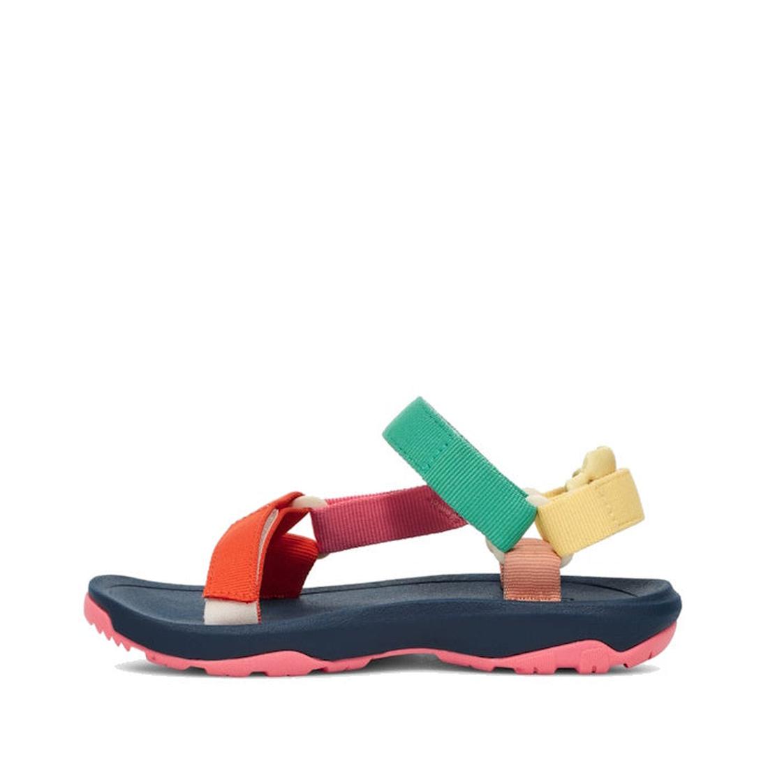 The Teva Kids K Hurricane XLT2 Popcorn Multi sandal features a navy sole, pink tread, and adjustable recycled fabric straps in red, pink, green, yellow, and peach. Shown from the side against a white background., 196565921888, 196565921895, 196565921864, 