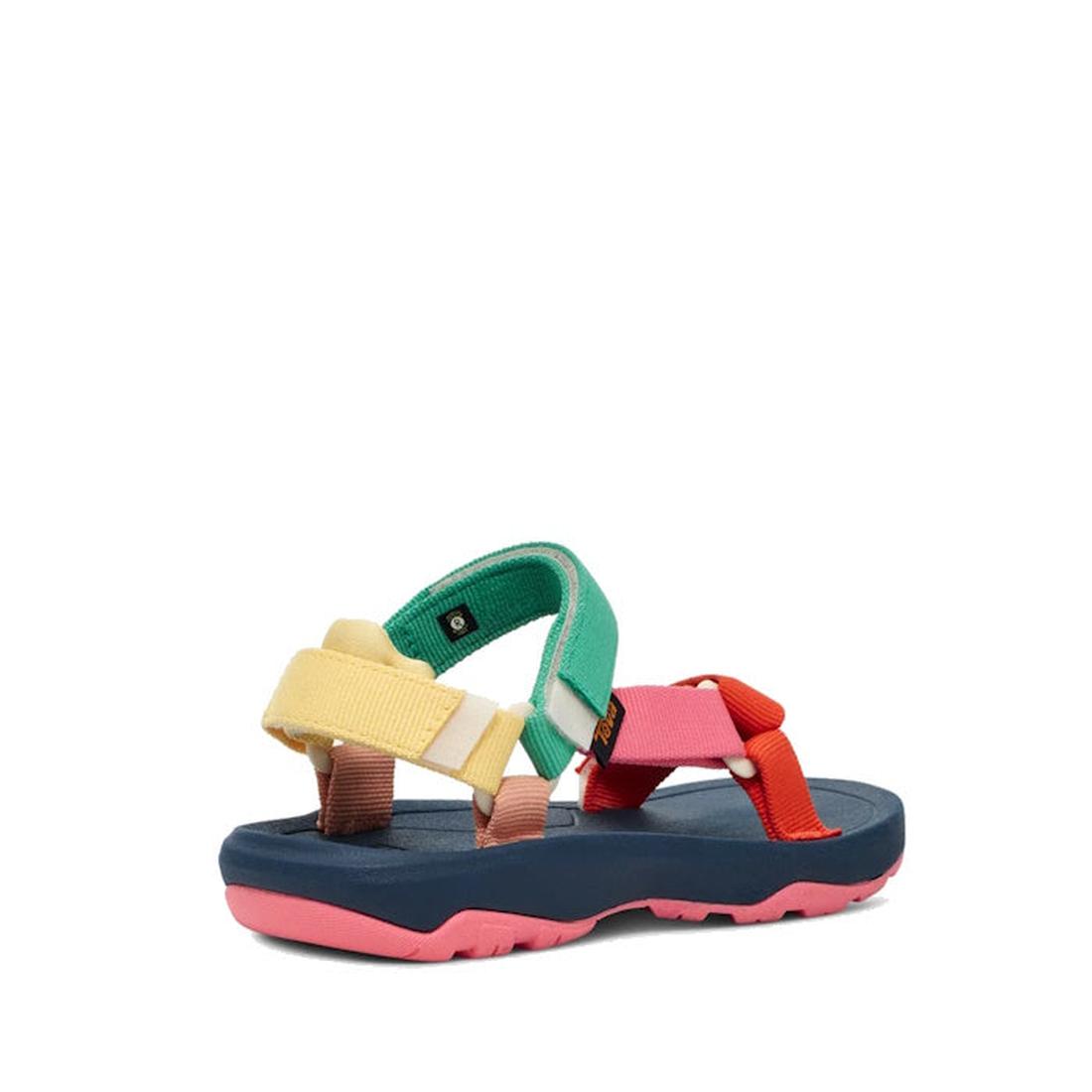 The Teva Kids K Hurricane XLT2 Popcorn Multi sandal features a blue footbed, pink sole, and vibrant yellow, green, and red recycled-material straps—shown on a white background., 196565921888, 196565921895, 196565921864, 196565921857, 196565921901, 1965659