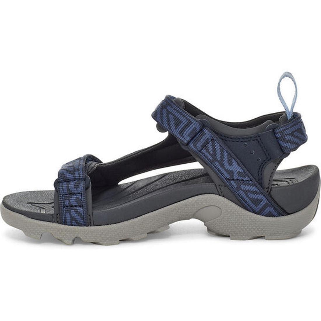 The Teva Boys Active Rugged Sandal K Tanza Blue is a navy and gray sport sandal with adjustable recycled polyester straps, a thick textured sole, and heel pull loop, shown against a white background., 194715413832, 194715413887, 194715413856, 194715413801