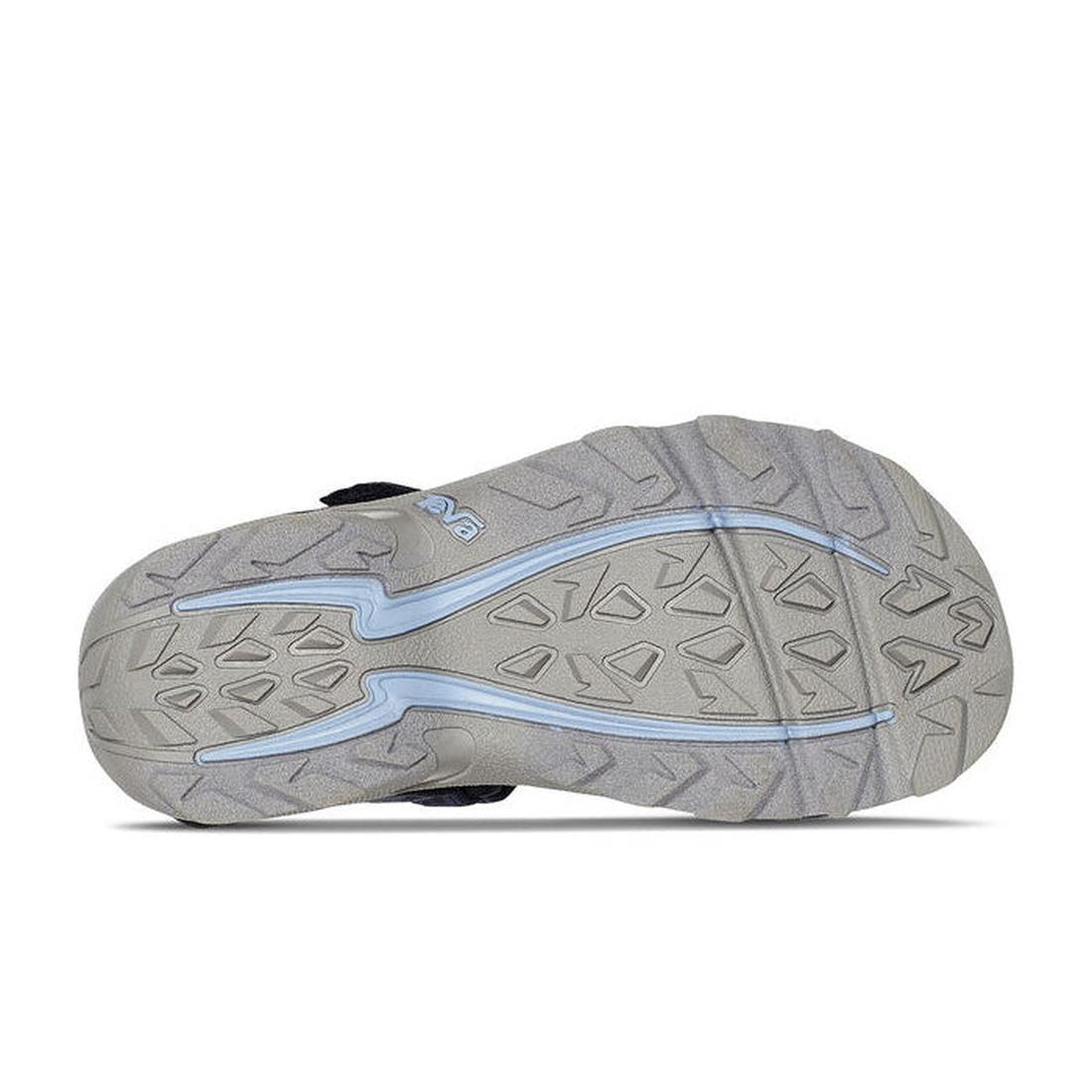 The image shows the gray, textured sole of the Teva Boys Active Rugged Sandal K Tanza Blue, featuring geometric tread patterns and light blue accent lines running along its length., 194715413832, 194715413887, 194715413856, 194715413801, 194715413818, 194