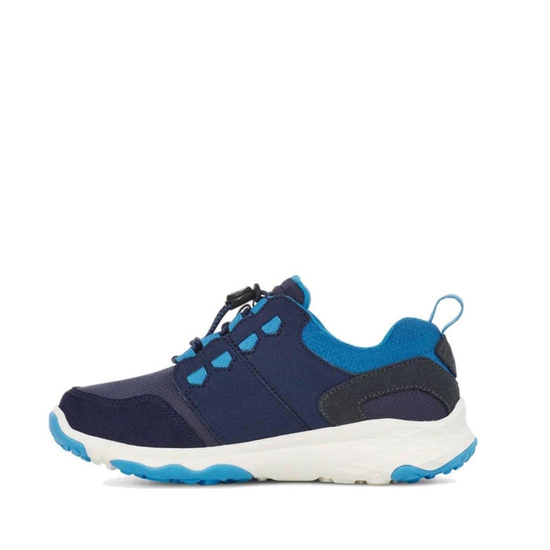 The Teva Kids K Canyonview Mid Waterproof Hiker in Midnight Navy (US 11–3) features a breathable mesh upper, rubber outsole, white sole, black accents, and blue tread, shown in side profile on a white background., 196565427229, 196565427236, 196565427243,