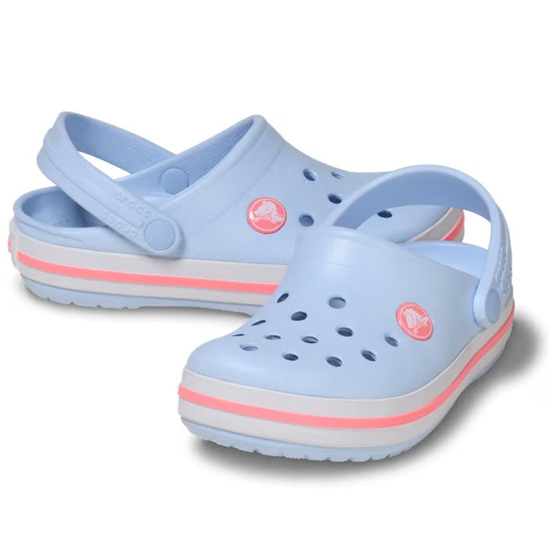 The Crocs Kids Toddlers Crocband Clogs in Blue Frost/Guava feature a light blue design with pink and white racing stripes on the sole, ventilation holes on top, and adjustable heel straps for comfortable everyday wear.