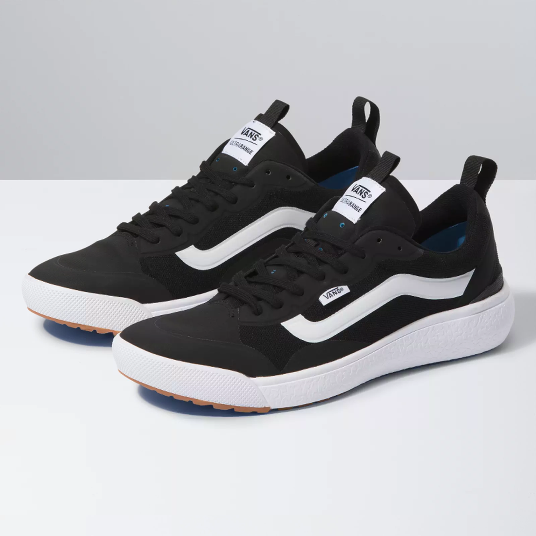 Vans Ultrarange Exo adult sneakers in classic black and white, with comfy white soles, cushioned UltraCush midsole, and lace-up style.  ksnz