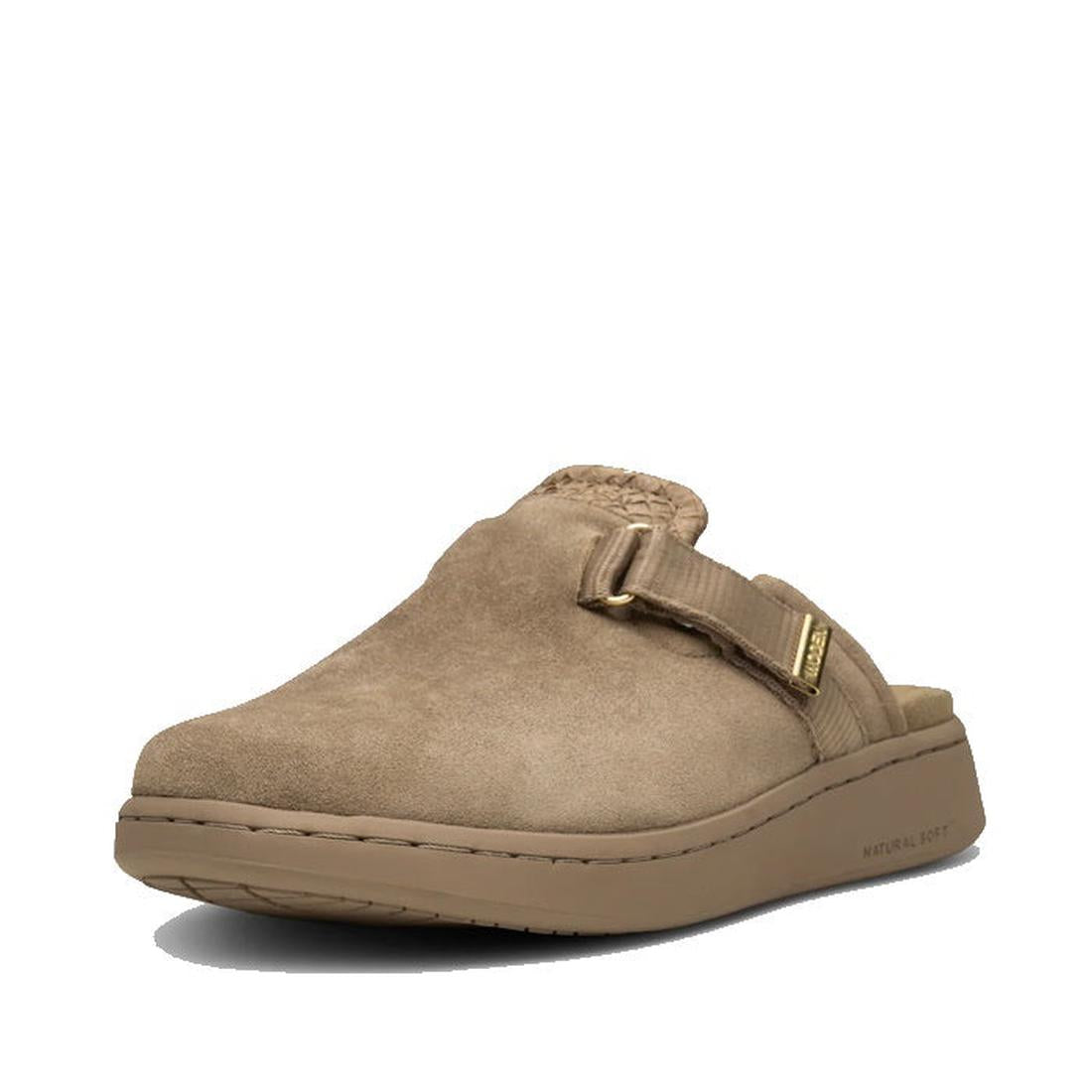 The Woden Womens Vega Clog Suede Mule in Silver Mink (Beige) features a suede upper, cushioned Natural Soft sole, woven top detail, and an adjustable side strap with metal buckle. The plain white background accentuates its style.