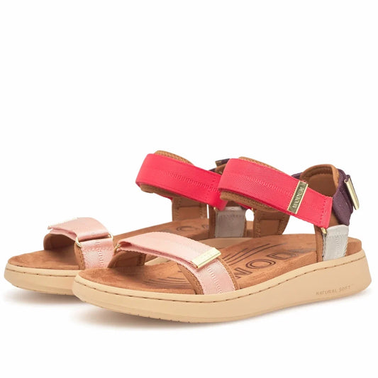 Introducing the Woden Line Women's 3 Strap Sandal in Flame Multi Red—a vibrant pair of sandals featuring pink, coral, purple, and beige straps with convenient Velcro closures and light brown soles. These comfortable sandals are a must-have addition to you