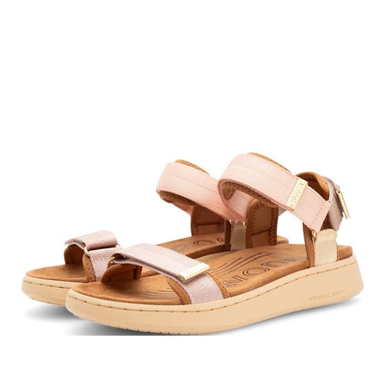 A pair of Woden Line Women’s 3 Strap Sandal Blush Multi, shown from a side angle on a white background, featuring pink and beige adjustable straps and cushioned tan soles with Natural Soft technology for enhanced comfort.