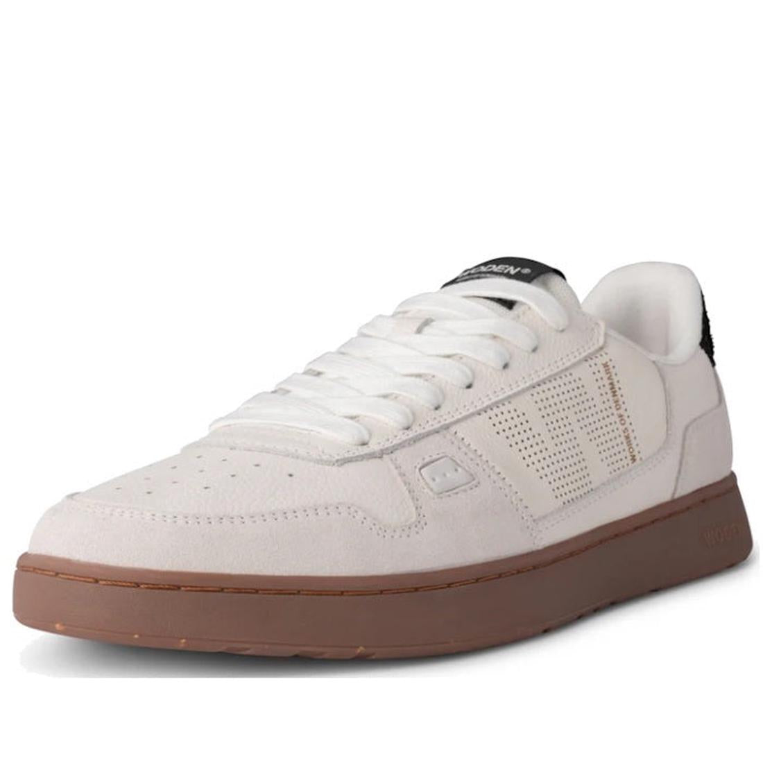 Woden Men's Halfdan Sneaker offers white low-top leather, comfy brown sole, secure white laces, and a stylish black heel detail.  ksnz