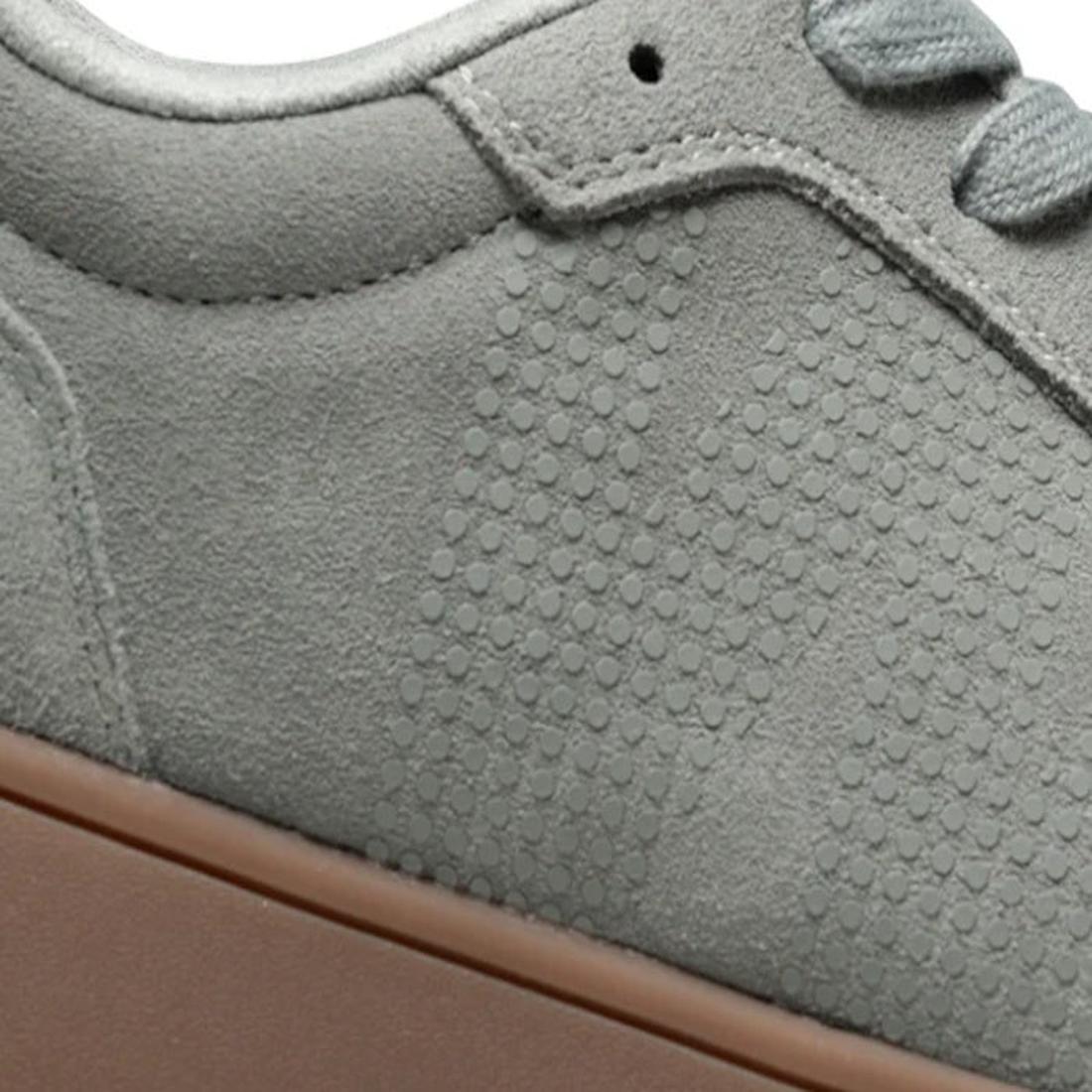 Close-up of the Woden Mens Tote Autumn Grey Sneaker Suede, featuring certified suede with a dotted pattern, gray laces, and a brown rubber sole., 46547, 46548, 5713326540987, 5713326540994, 5713326541007, 46546
