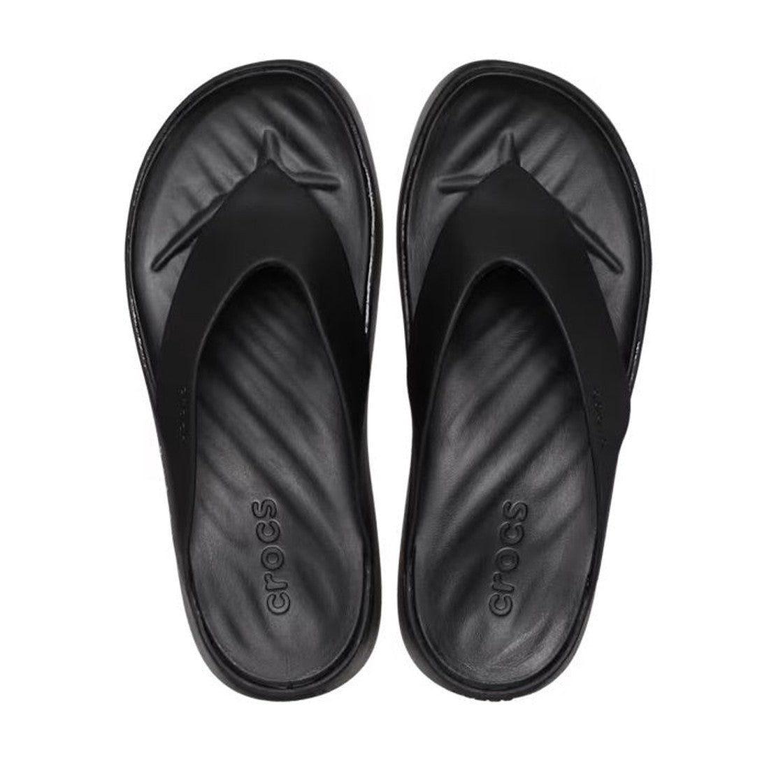 A pair of Crocs Womens Getaway PLATFORM Flip Sandals in black, shown from above with textured footbeds and visible Crocs logo. Enjoy all-day comfort in every step thanks to Free Feel Technology., 42101, 196265540471, 196265540488, 196265540495, 1962655405