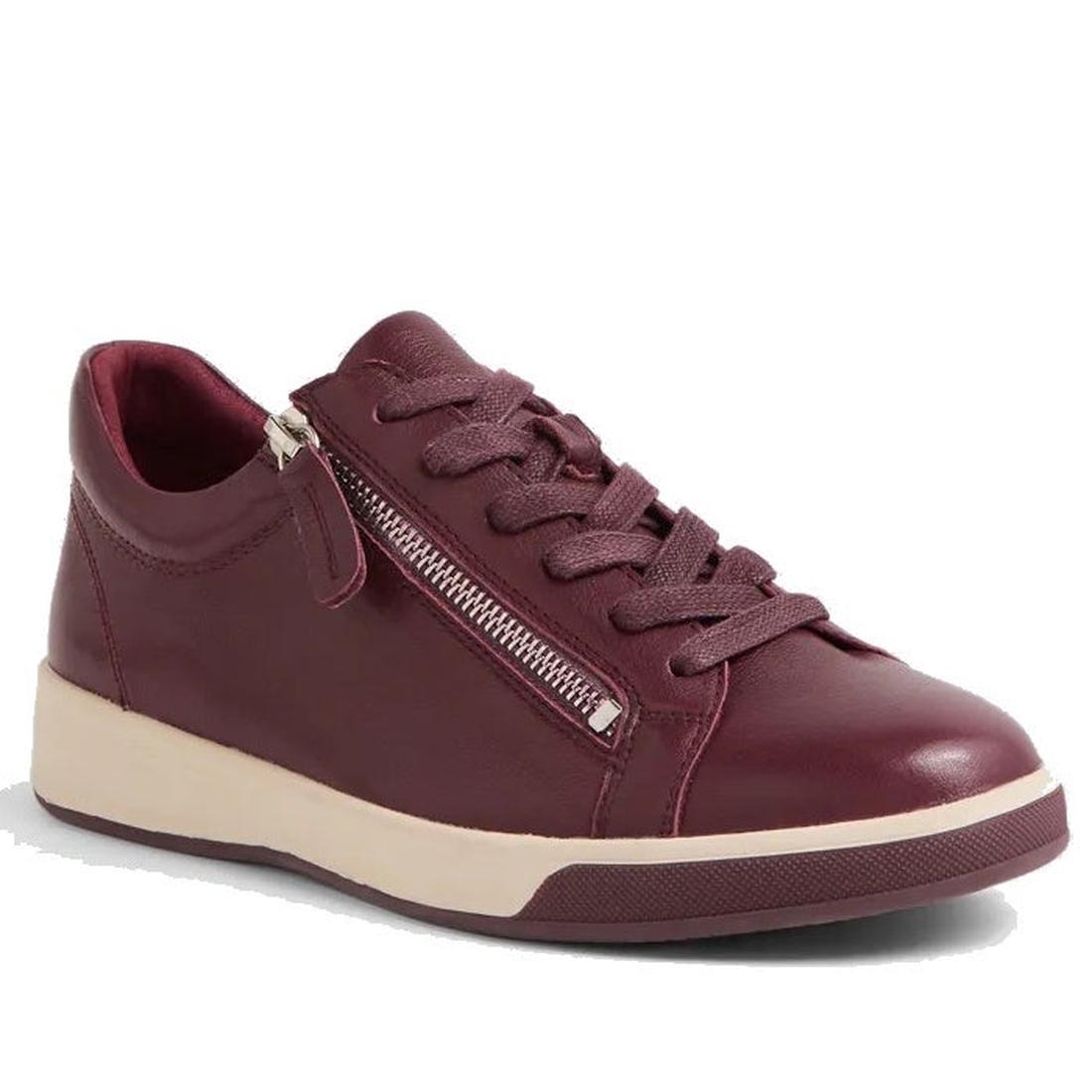 The Ziera Aito XF Women's Casual Sneaker Zip in Burgundy features maroon leather, matching laces, a side zipper, a white rubber sole, and an extra wide fit for stylish everyday comfort.