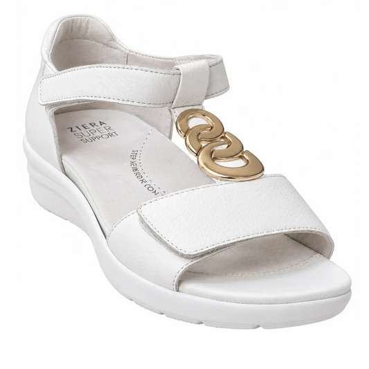 The Ziera Nextime White Women’s Leather Sandal XW Closed Back features a white leather upper with an open toe, thick sole, adjustable ankle strap, and gold chain embellishment. The insole displays the Ziera SUPER SUPPORT text and is designed for orthotic 
