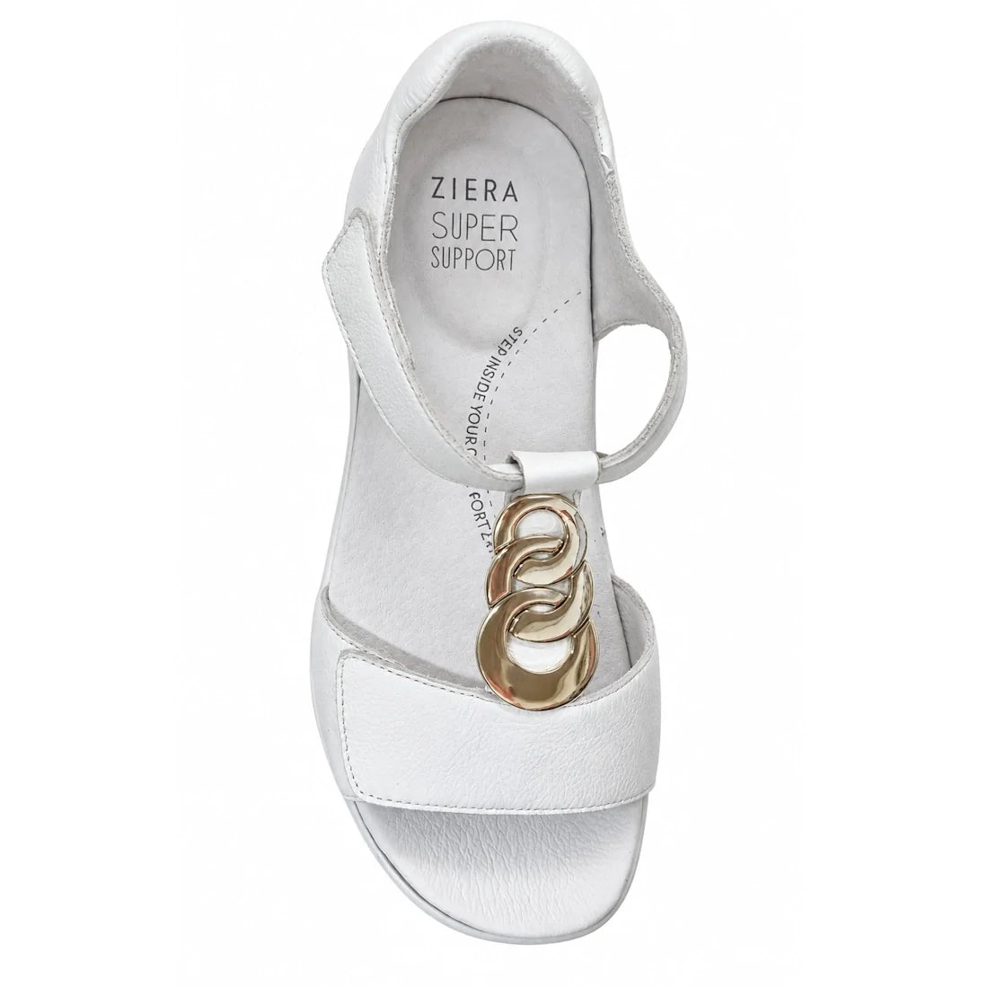 The Ziera Nextime White Womens Leather Sandal XW Closed Back features a wide front strap, metallic gold decorative rings, and closed-back ankle support. Designed in the signature Ziera Nextime style, this sandal provides a wide fit and is orthotic-friendl